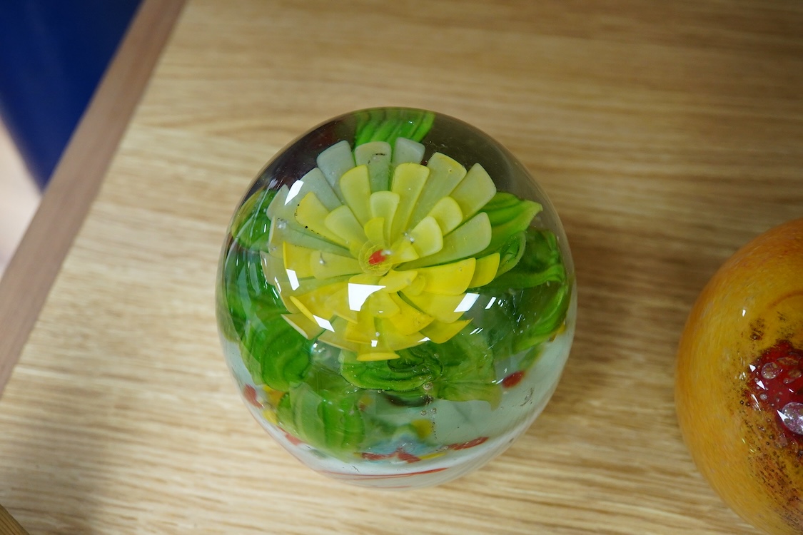 A Collection of five various glass paperweights, largest 11cm